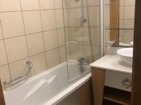 a bathroom with a shower and a tub and a sink at Appartement Les Arcs 1800, 2 pièces, 4 personnes - FR-1-346-318 in Arc 1800