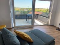 Balkón alebo terasa v ubytovaní Daniela Family Apartment - top floor - new & quite location - great sea & island view