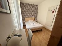 A bed or beds in a room at Albergo San Remo
