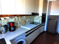 Kuchyňa alebo kuchynka v ubytovaní Le Foch - Appartement face mer avec garage