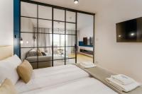 Łóżko lub łóżka w pokoju w obiekcie Klif Apartamenty Polanki Aqua A414