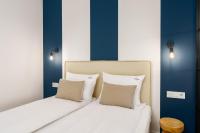 Łóżko lub łóżka w pokoju w obiekcie Klif Apartamenty Polanki Aqua A414