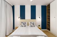 Łóżko lub łóżka w pokoju w obiekcie Klif Apartamenty Polanki Aqua A414
