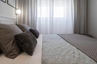 Posteľ alebo postele v izbe v ubytovaní City Lux Apartment 1- with garage and balcony