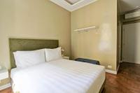 A bed or beds in a room at The river corner