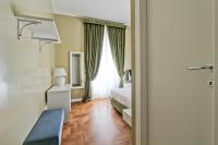 A bed or beds in a room at The river corner