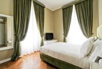 A bed or beds in a room at The river corner
