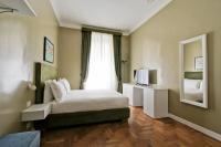 A bed or beds in a room at The river corner
