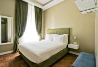 A bed or beds in a room at The river corner