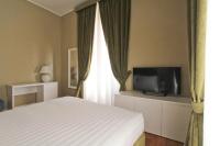 A bed or beds in a room at The river corner