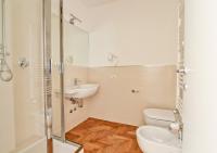 A bathroom at The river corner