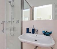 A bathroom at The river corner