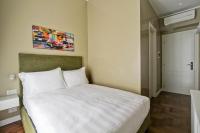 A bed or beds in a room at The river corner