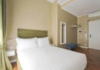 A bed or beds in a room at The river corner