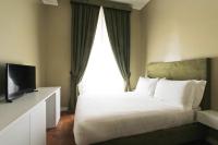 A bed or beds in a room at The river corner