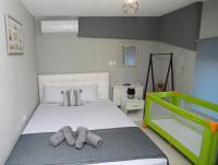 A bed or beds in a room at iLposto Down