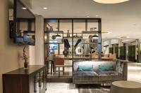 a living room with a couch and a table at Holiday Inn Toronto Downtown Centre by IHG in Toronto