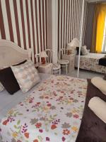 A bed or beds in a room at Apartamentos Oscar