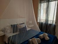 A bed or beds in a room at Apartamentos Oscar