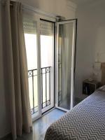 Posteľ alebo postele v izbe v ubytovaní Encantador apartamento residencial con piscina