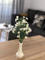 Posedenie v ubytovaní Encantador apartamento residencial con piscina