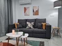 Posedenie v ubytovaní Encantador apartamento residencial con piscina