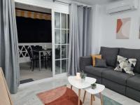 Posedenie v ubytovaní Encantador apartamento residencial con piscina