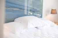 Łóżko lub łóżka w pokoju w obiekcie HOTEL LA QUIETUDE