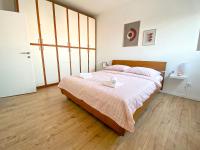 Posteľ alebo postele v izbe v ubytovaní RJ’s Apartment