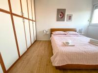 Posteľ alebo postele v izbe v ubytovaní RJ’s Apartment