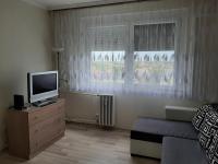 Telewizja i/lub zestaw kina domowego w obiekcie Sunnyrise Apartman