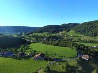 an aerial view of a village in the hills at gite chez Maise in Le Val-dʼAjol