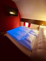 Posteľ alebo postele v izbe v ubytovaní Spa & Wellness Hotel Orchidea