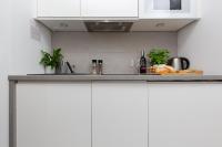 Kuchyňa alebo kuchynka v ubytovaní Apartments Varsovia Kasprzaka by Noclegi Renters