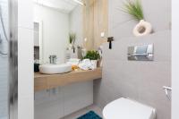 Kúpeľňa v ubytovaní Apartments Varsovia Kasprzaka by Noclegi Renters