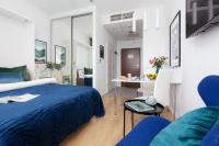 Posteľ alebo postele v izbe v ubytovaní Apartments Varsovia Kasprzaka by Noclegi Renters