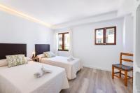 A bed or beds in a room at Albercutx Pollentia 3