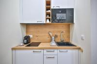 Kuchnia lub aneks kuchenny w obiekcie New Triplex 6Pers#ETOILE#Porte Maillot#Porte Champerret