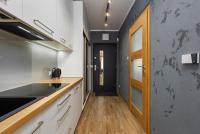 Kuchyňa alebo kuchynka v ubytovaní Czarna Perła- Apartament przy Solisku