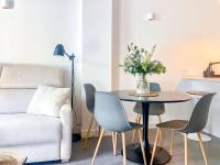Posezení v ubytování OleHolidays 406 Loft Romana Playa junto al mar