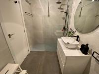 Koupelna v ubytování OleHolidays 406 Loft Romana Playa junto al mar