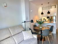Kuchyň nebo kuchyňský kout v ubytování OleHolidays 406 Loft Romana Playa junto al mar