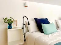 Postel nebo postele na pokoji v ubytování OleHolidays 406 Loft Romana Playa junto al mar