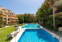 Bazén v ubytování OleHolidays 406 Loft Romana Playa junto al mar nebo v jeho okolí