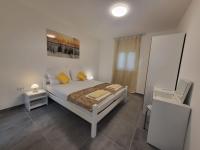 Postel nebo postele na pokoji v ubytování Holiday Home Joly