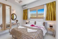 A bed or beds in a room at Villa Kery by Villa Plus