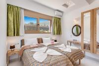A bed or beds in a room at Villa Kery by Villa Plus