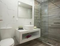 Koupelna v ubytování Hermes Hotel