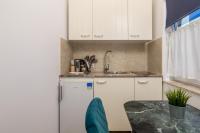 Kuchyňa alebo kuchynka v ubytovaní Apartments Villa Chiara Opatija