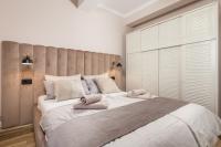 Posteľ alebo postele v izbe v ubytovaní Apartments Villa Chiara Opatija